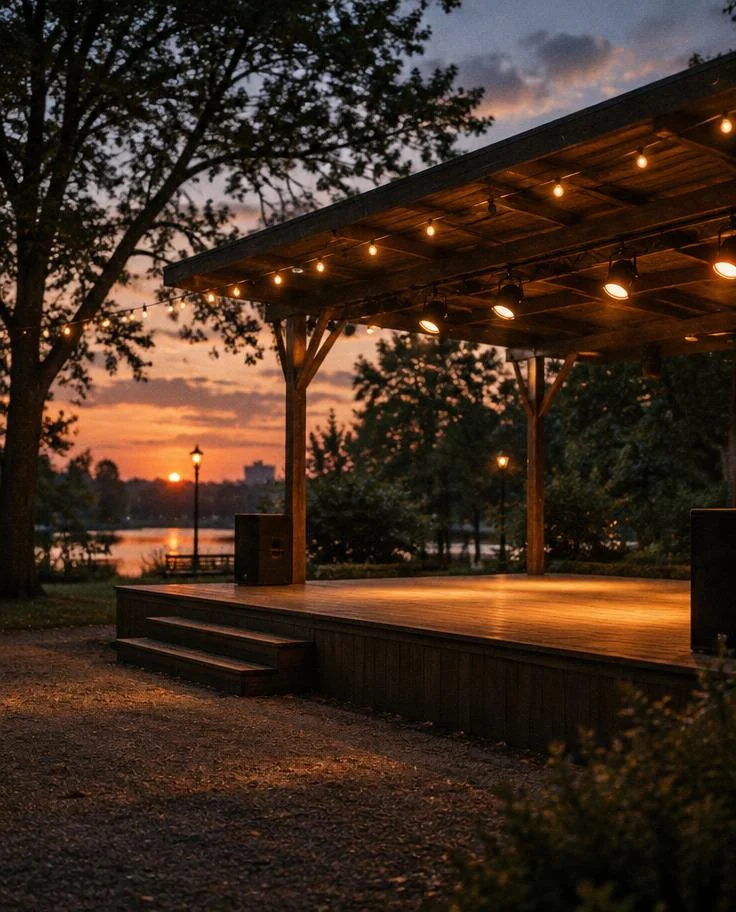 Outdoor wooden stage at dusk